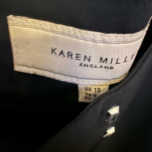 Karen Miller suit used black with velvety details