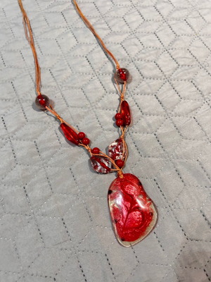 Necklace with red stones like new