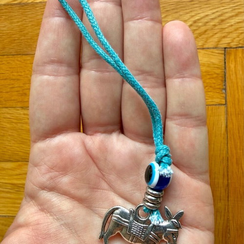 Donkey keychain like new with silver motif and blue eye bead