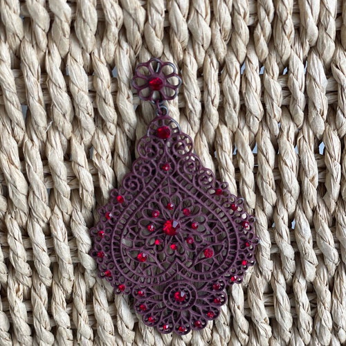 Long burgundy earrings used with color wear