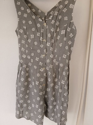 One-piece shorts jumpsuit with straps and buttons, new, size M