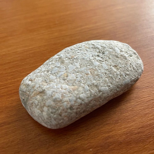 Natural limestone pebble new, smoothed from beach