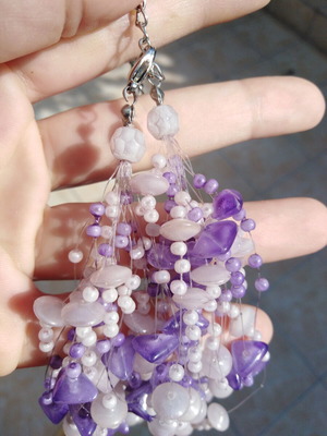 Handmade necklace with purple and white beads