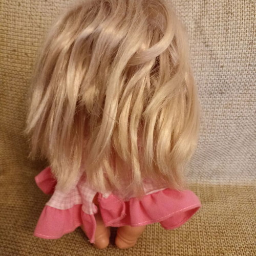 Doll with long hair like new