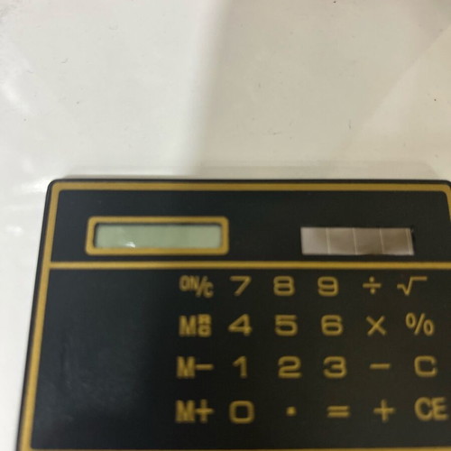 Ultra Thin Calculator with Touchscreen and Solar Power, Like New