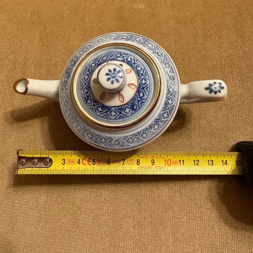 Chinese porcelain miniature teapot with 4 small cups like new