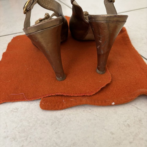 Peep toe heels used, size 38, bronze with leather knot detail