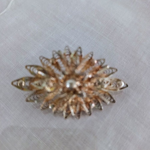 Vintage filigree sun brooch with pearls used