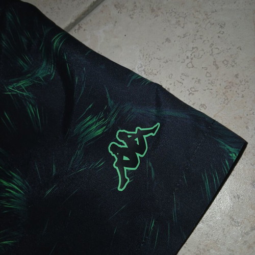 Kappa swimsuit new, size medium, black and green with pockets