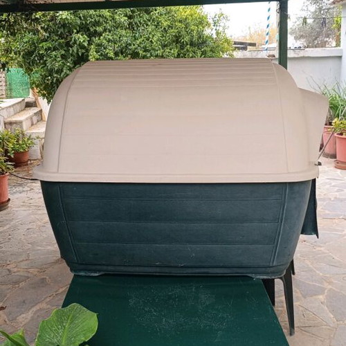 Dog house used with missing front side and durable dog bed