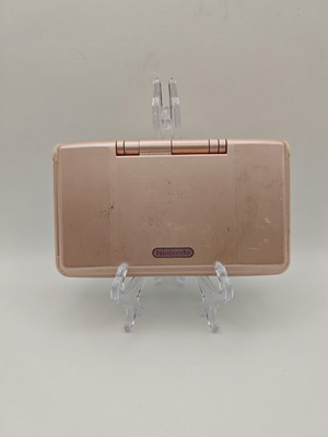 Nintendo DS pink handheld console used with charger and stylus