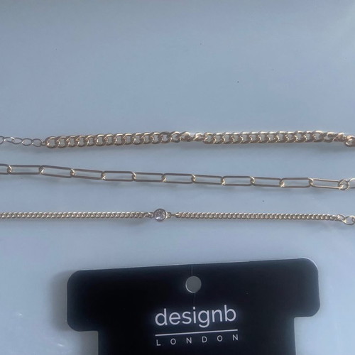 Three gold plated bracelets Design Letters used