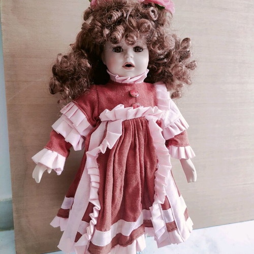 Porcelain doll like new