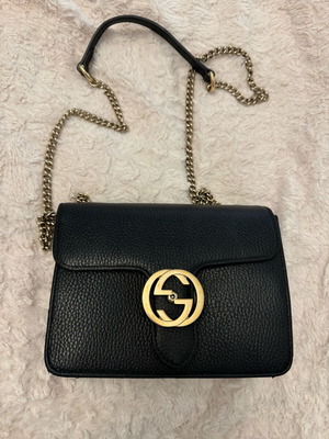 Gucci Interlocking G shoulder bag black with gold hardware like new