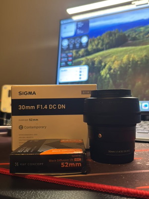 Sigma 30mm f/1.4 DC DN lens like new with K&F Black Diffusion filter 52mm