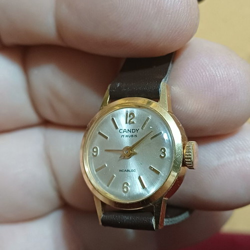 Candy 17 Rubis wristwatch like new, mechanical, gold case