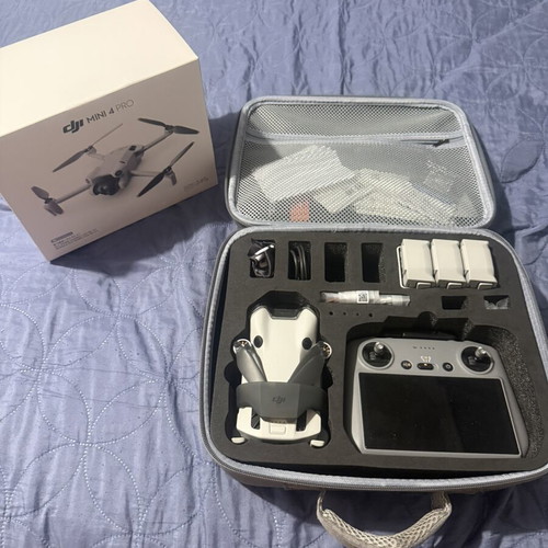 DJI Mini 4 Pro FlyMoreCombo with DJI RC2 controller