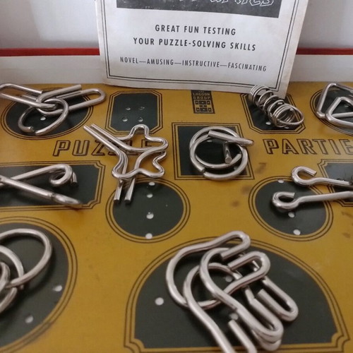 Retro wire puzzles game, 9 pieces with instructions, 3 missing