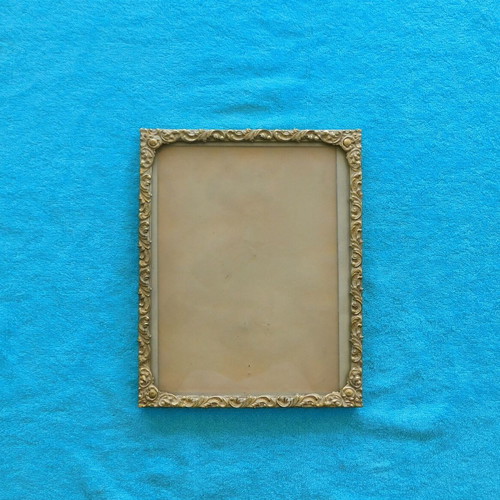 Bronze embossed photo frame vintage, used with protective glass