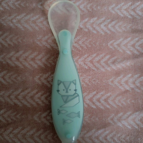 Silicone baby spoon used, ideal for first meals
