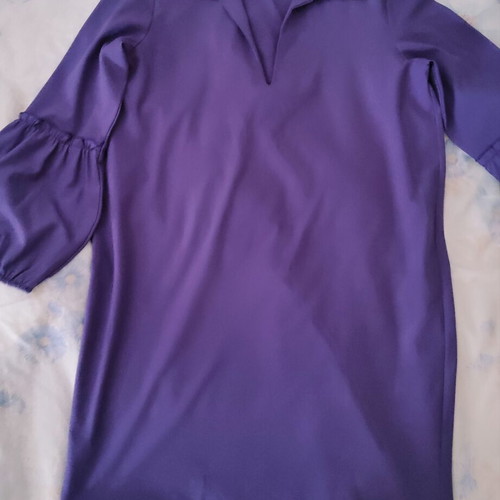 Purple dress used, medium to small, long sleeves, deep neckline