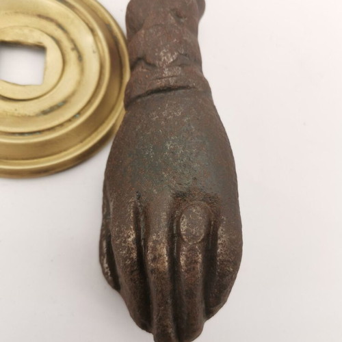 Bronze hand door knocker used from 1930 preserved door