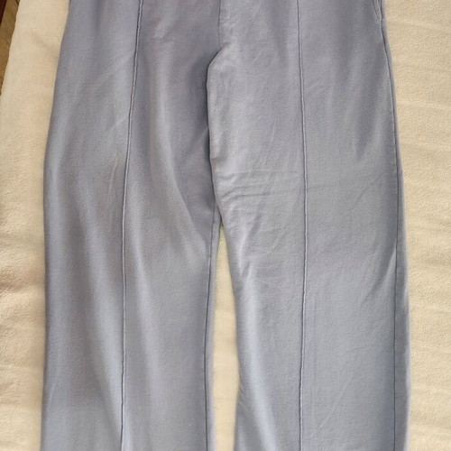 Sky blue jumpsuit in a wide straight line.
