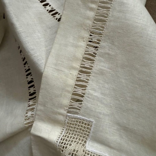 Handmade tablecloth used with openwork and lace, beige