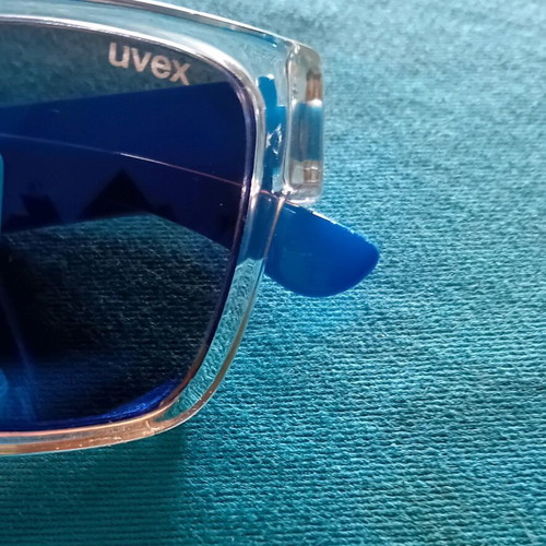 Uvex Kids Sunglasses polarized with blue arms and clear frame like new